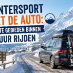 Auto met ski’s op besneeuwde bergweg richting wintersportgebied binnen 8 uur rijden vanaf Nederland